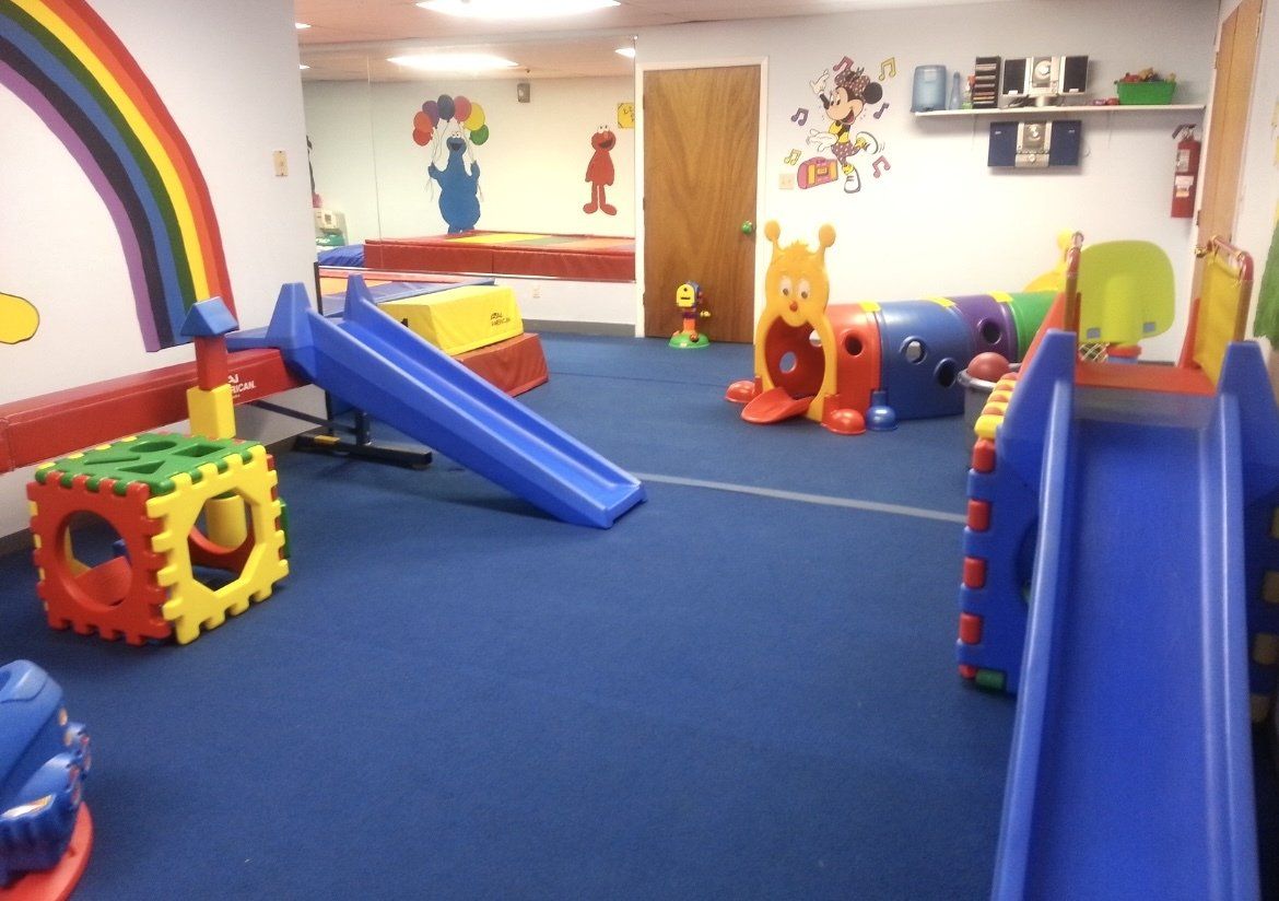 Family touring M.A.T.S.S. Kids Gym facility
